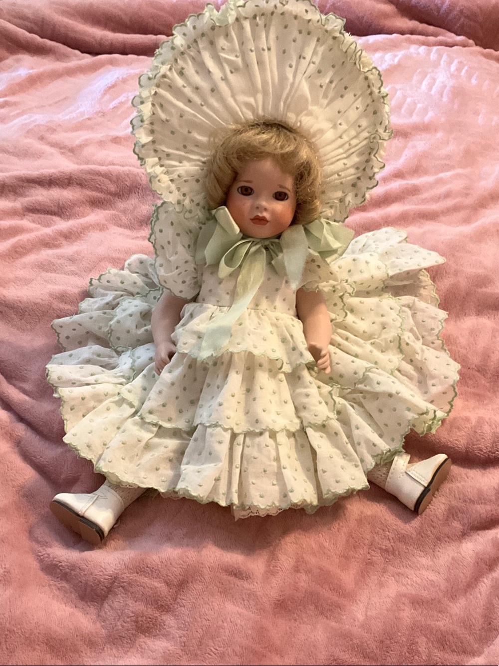 Vintage-Style Porcelain Doll in Pale Green Ruffled Dress and Bonnet